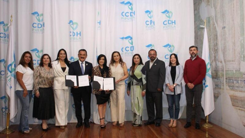 CDH Puebla y Cáritas firman convenio de colaboración