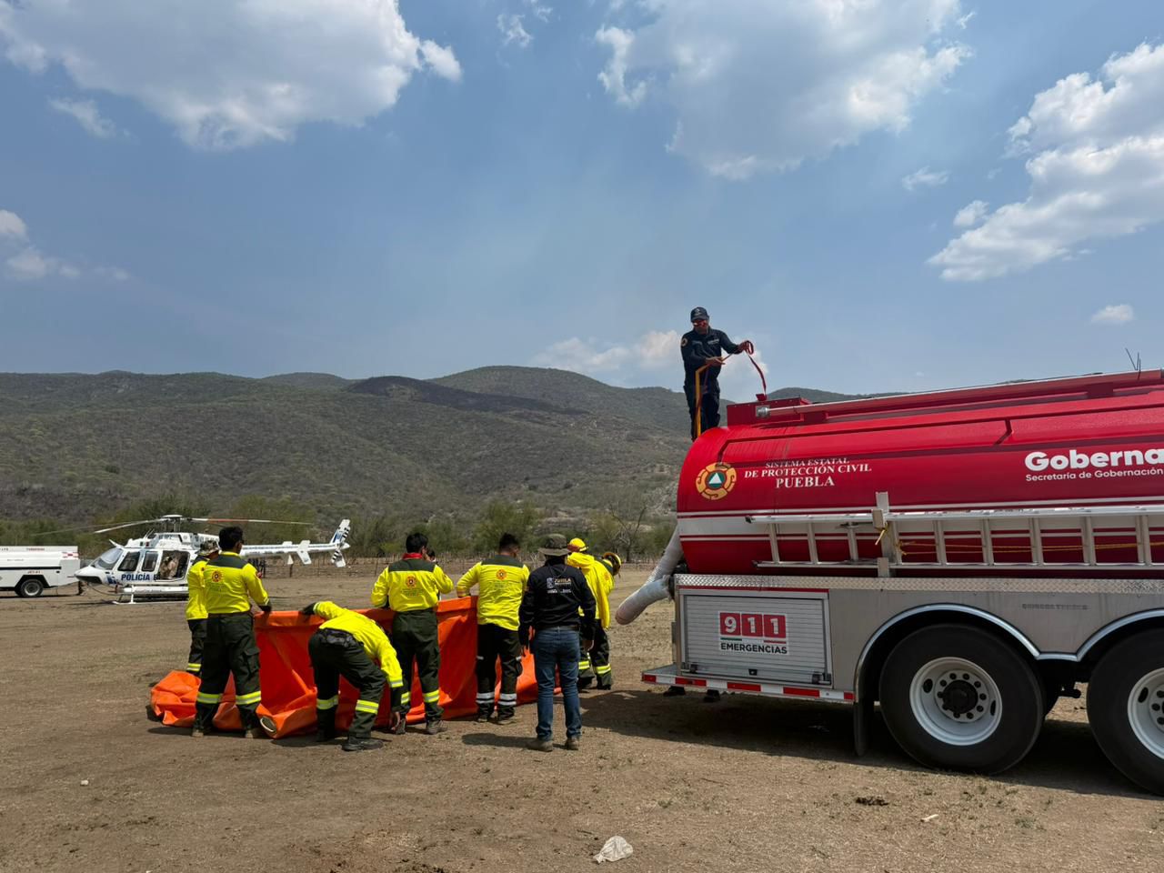 Respuesta inmediata de Policía Estatal Forestal y Protección Civil, Puebla ante reactivación de incendio en Cohetzala